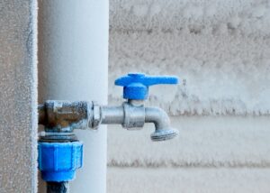 A frozen pipe in need of an emergency plumber in Overland Park